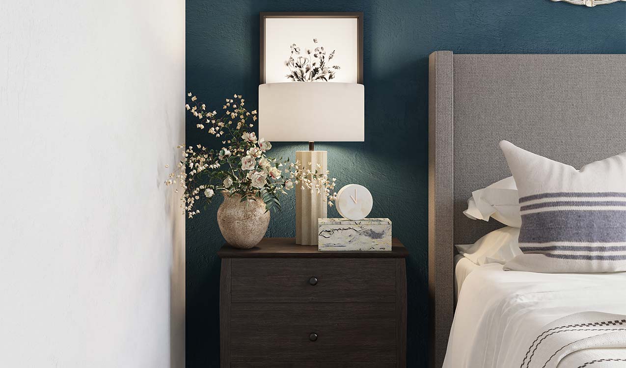 decor-on-nightstand-next-to-bed-in-bedroom-for-organized-apartment-living-space