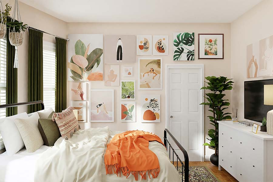 slightly-disheveled-bed-pillows-throw-wall-covered-with-artwork-peach-light-pink-walls-modern-style