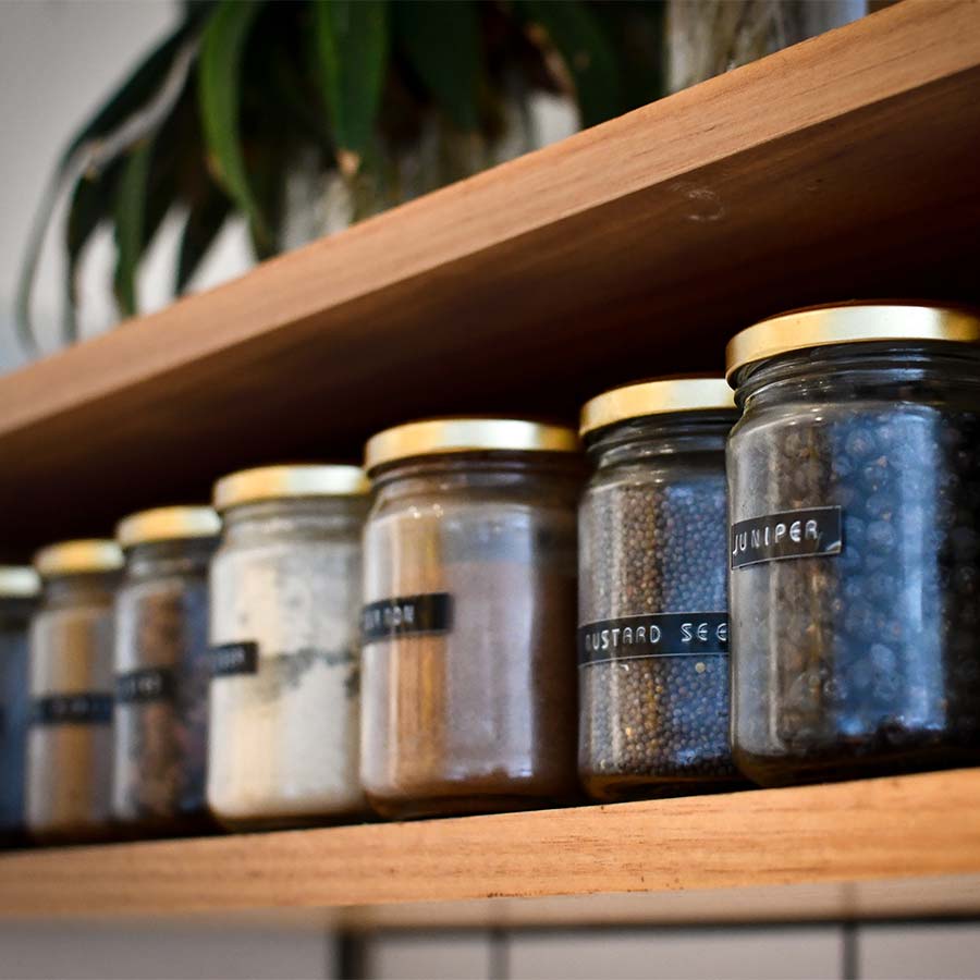 kitchen-shelf-organization-with-labeled-jars