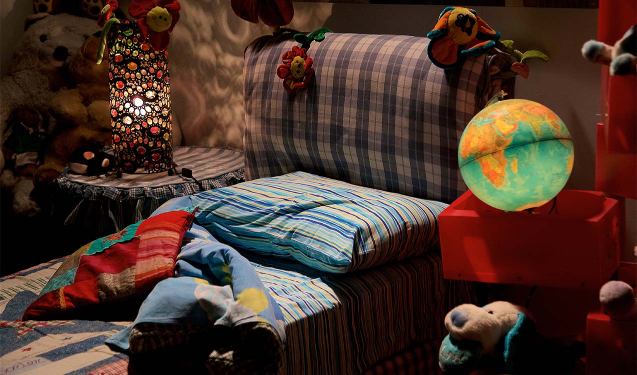 semi-cluttered-cozy-kids-room | The Personal Helpers