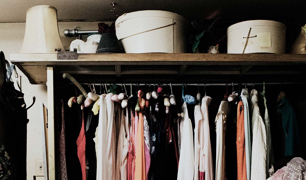 cluttered-nyc-apartment-closet-with-hats-boxes-hangers | The Personal Helpers