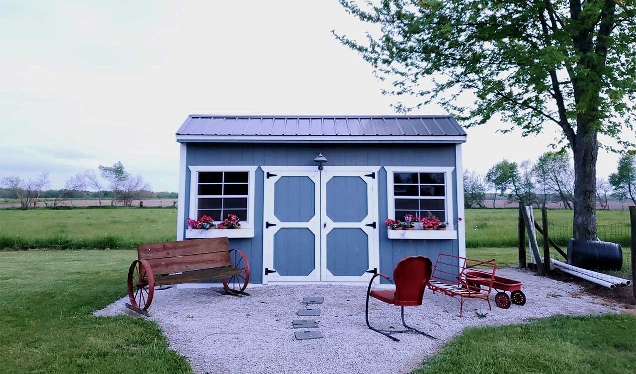 blue-white-shed-featuring-old-style-crate-benches | The Personal Helpers