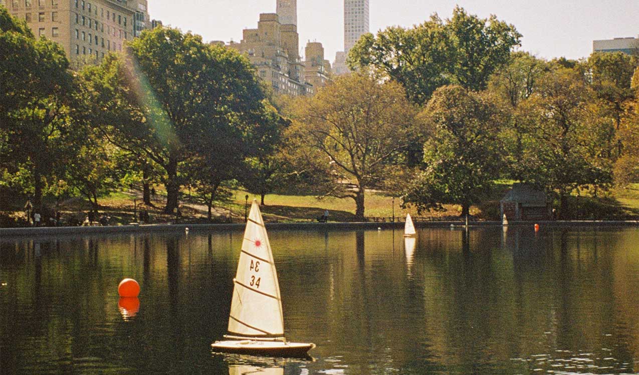central-park-lake-with-minature-boats-settling-into-a-new-neighborhood